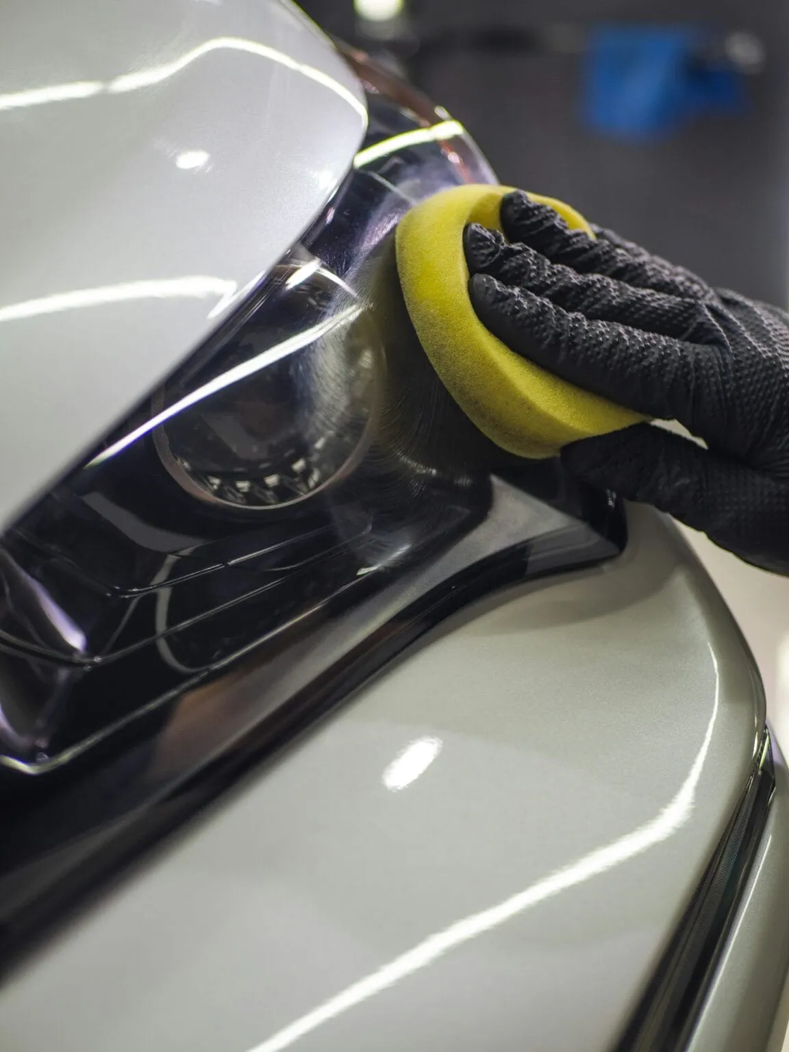 Applying wax to a car's painted surface