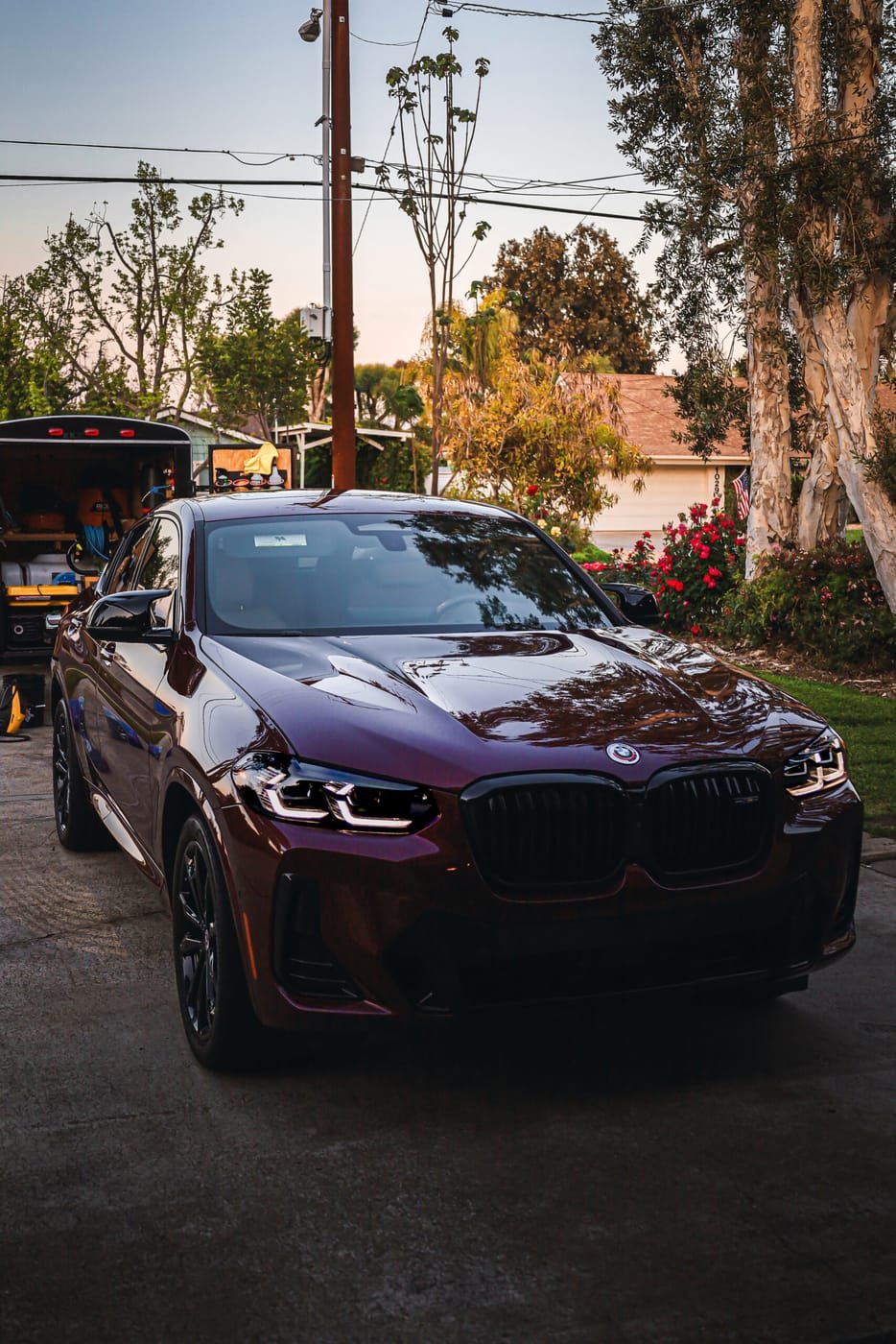 A red BMW showing signs it needs paint correction, before detailing