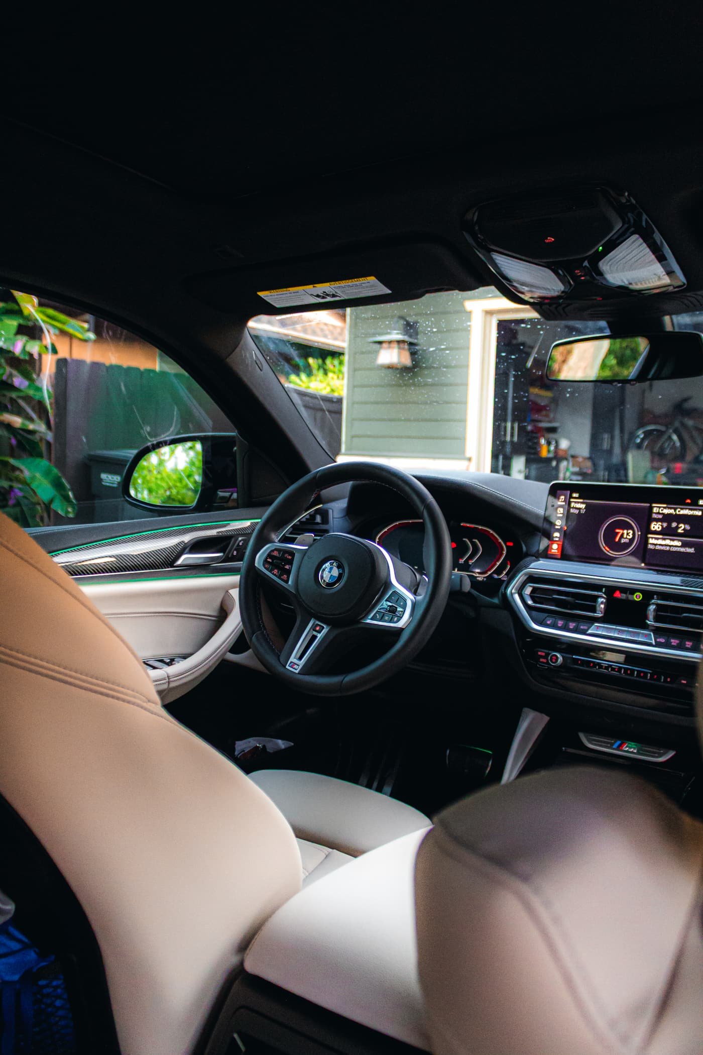 Clean tan leather BMW interior in La Mesa, CA, Joji's Mobile Detailing