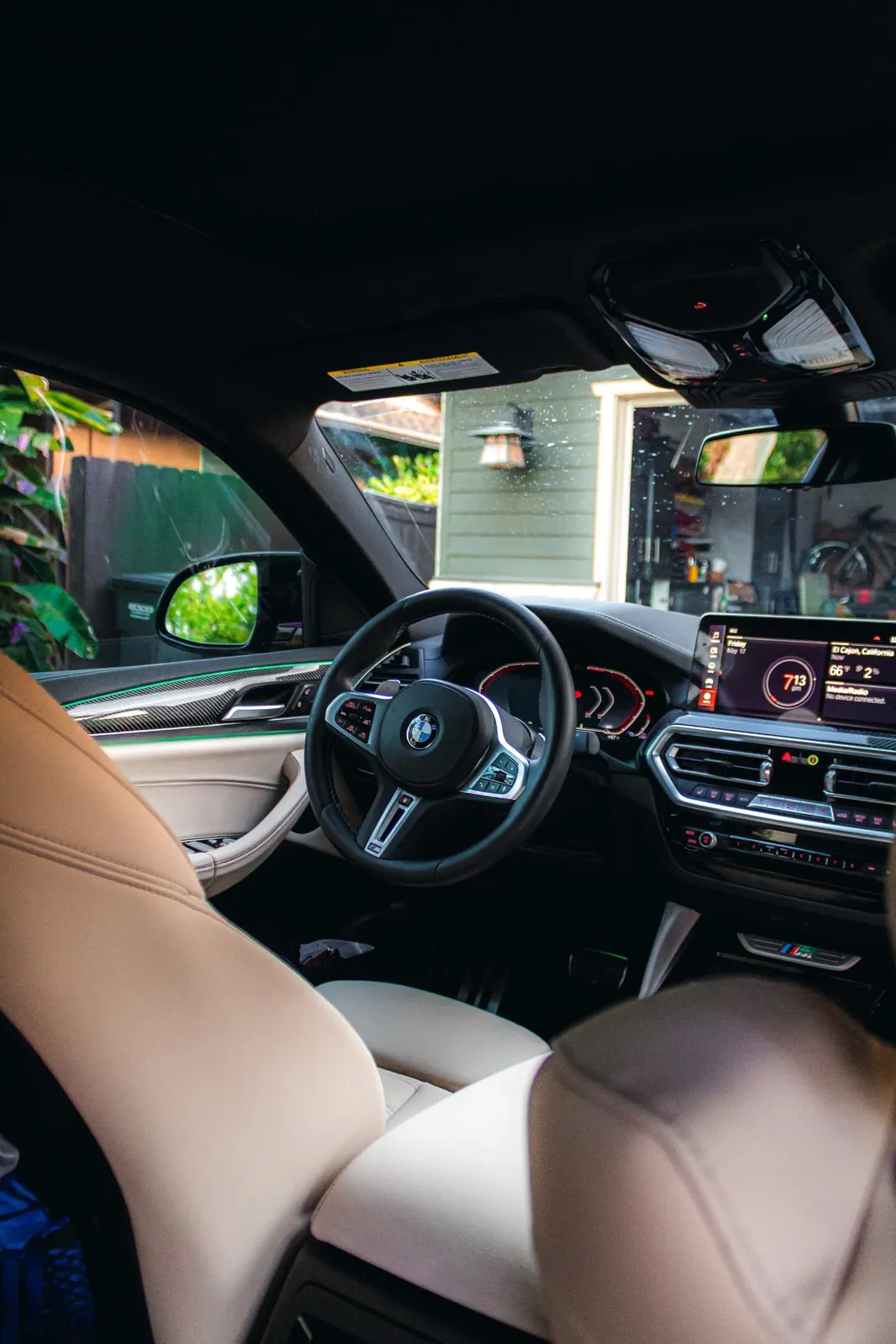 Clean tan leather BMW interior in Coronado, CA, Joji's Mobile Detailing