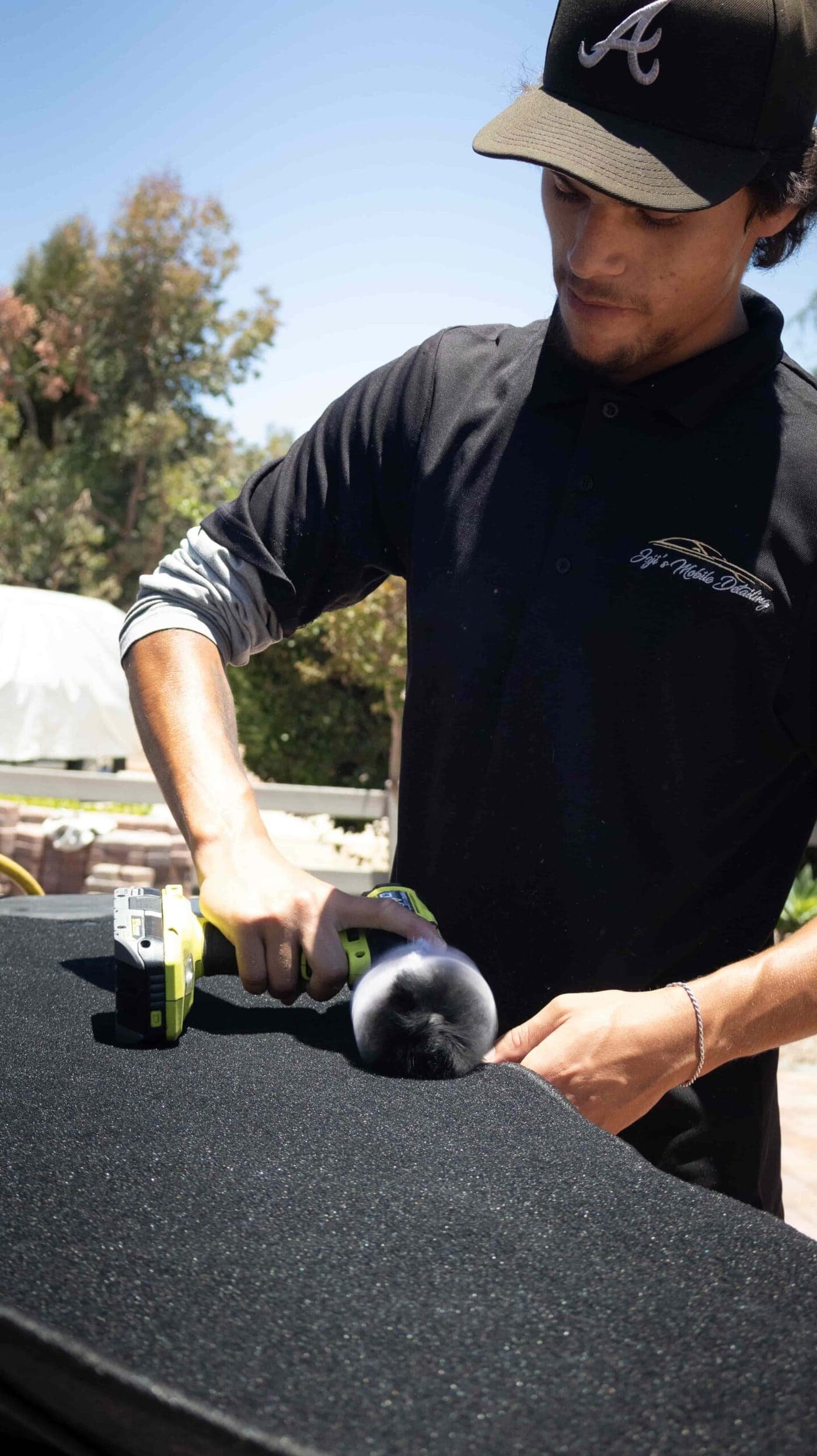 Technician performing carpet and mats extraction in San Diego