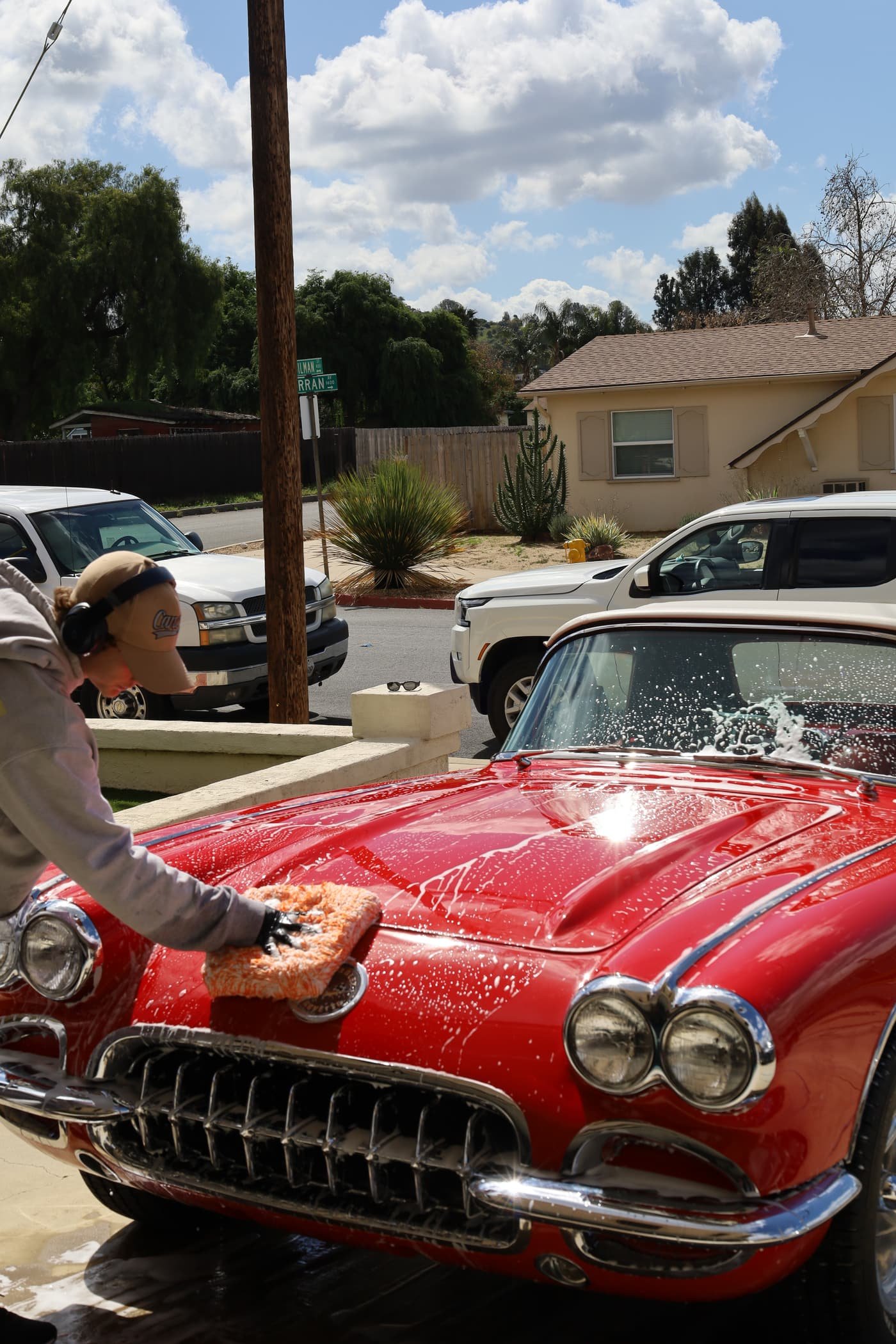 Hand-washing a classic Corvette in Rancho San Diego, CA, Joji's Mobile Detailing