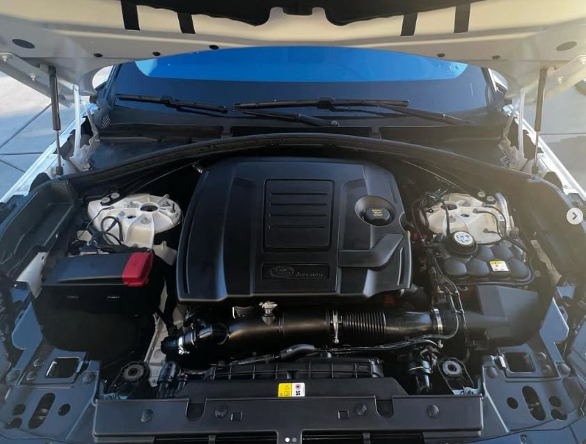 Clean, dressed engine bay after engine bay detail service in San Diego