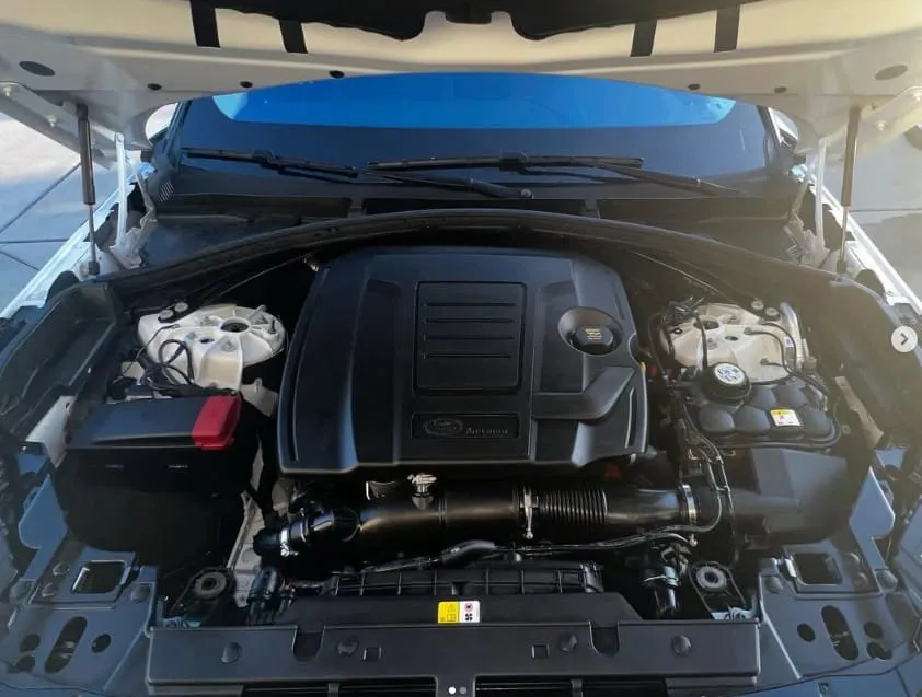 Clean, dressed engine bay after engine bay detail service in San Diego