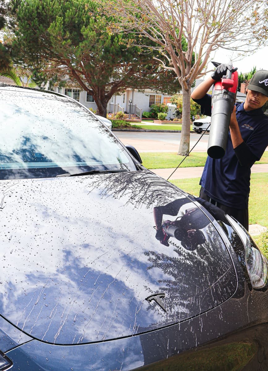 Joji's Mobile Detailing technician finishing an exterior wash in La Mesa, CA