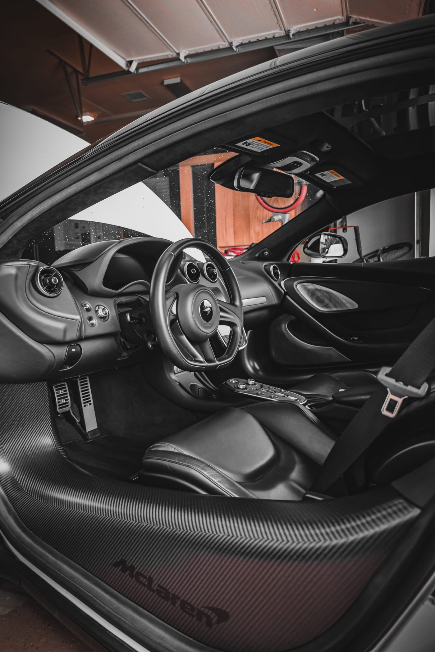 Clean, glossy leather seat after plastic, leather and vinyl shine service in San Diego
